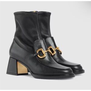 Gucci Black Heeled Boots with Gold Buckles